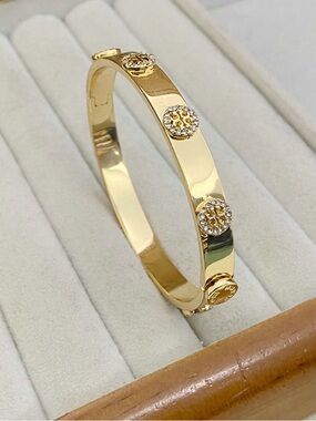 Tory Burch Elegant Gold and diamond Bangle